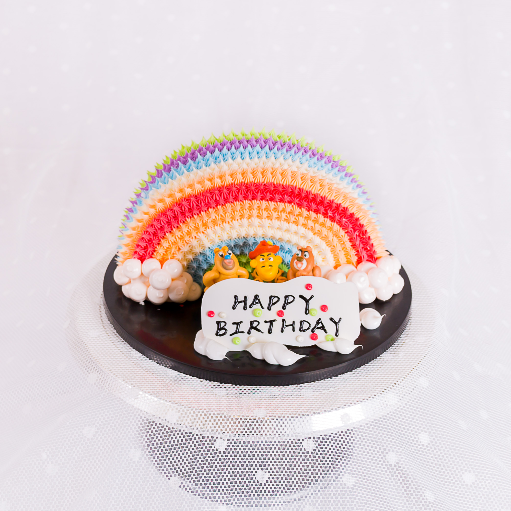 Pastel rainbow birthday cake with piped clouds and plaque, La-Luscious Bakery Grays