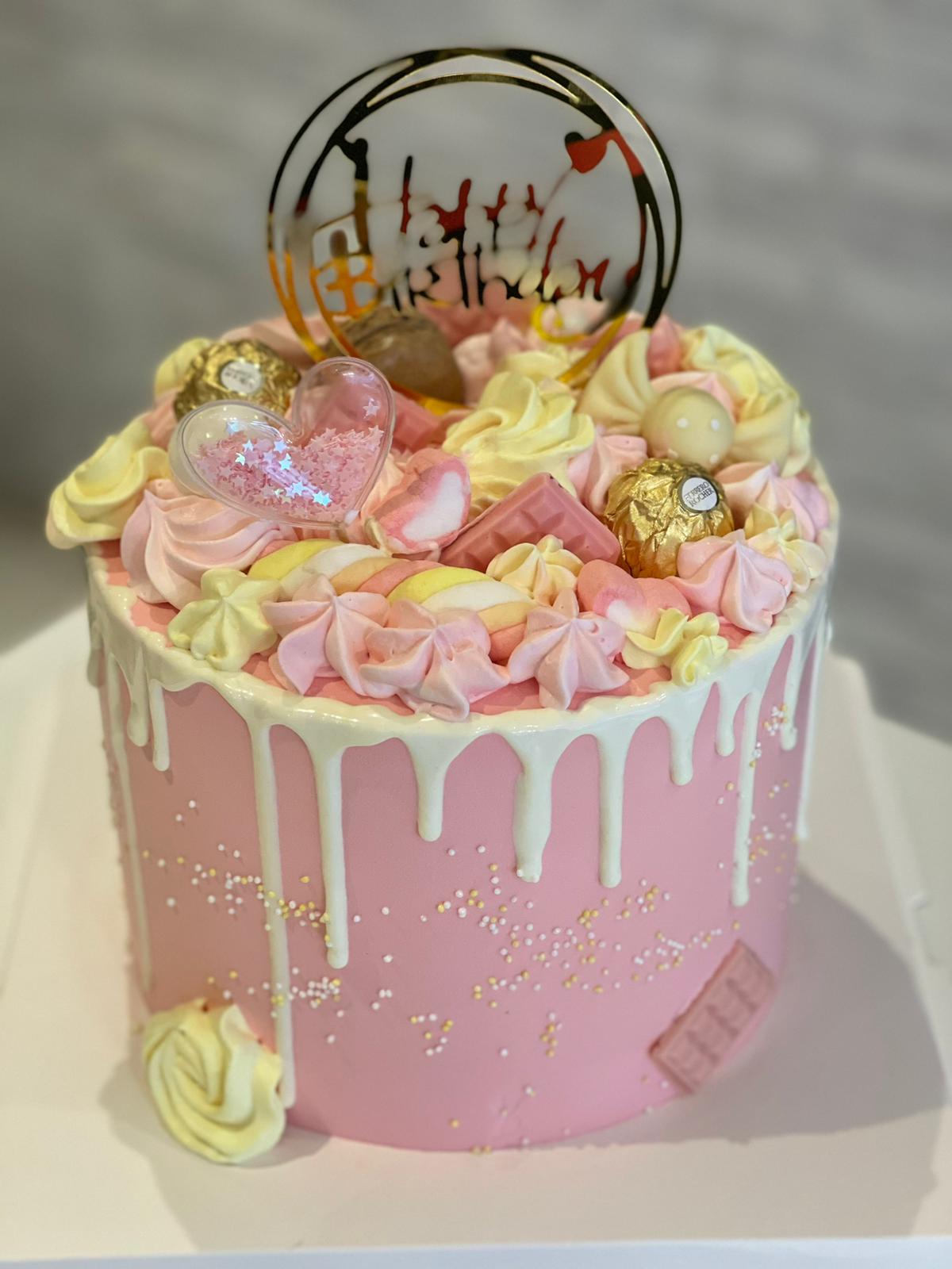 Pastel drip birthday cake with piped florals and gold topper, La-Luscious Bakery Grays