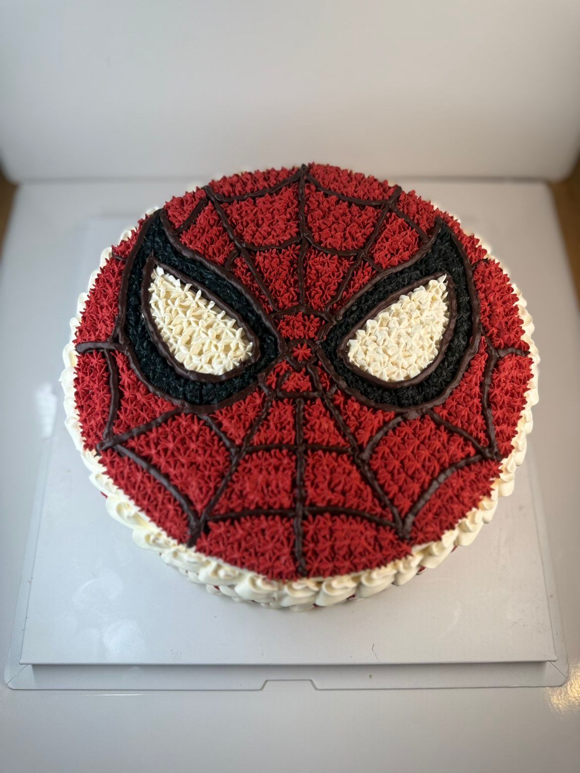 Superhero mask birthday cake for children in Grays, La-Luscious Bakery Grays