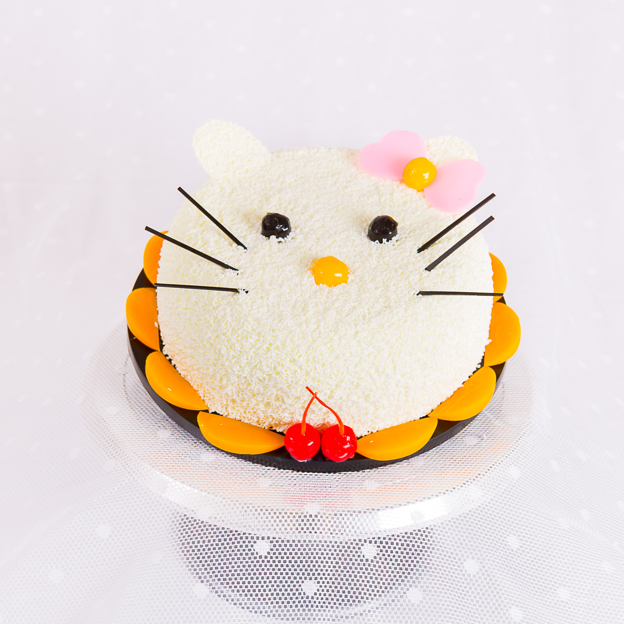 Hello Kitty shaped children's birthday cake with cherries, La-Luscious Bakery Grays
