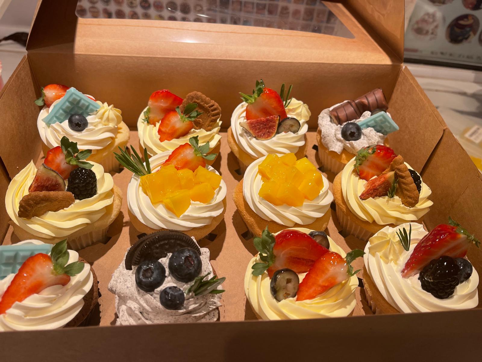 Selection box of fresh cream and fruit topped cupcakes, La-Luscious Bakery Grays