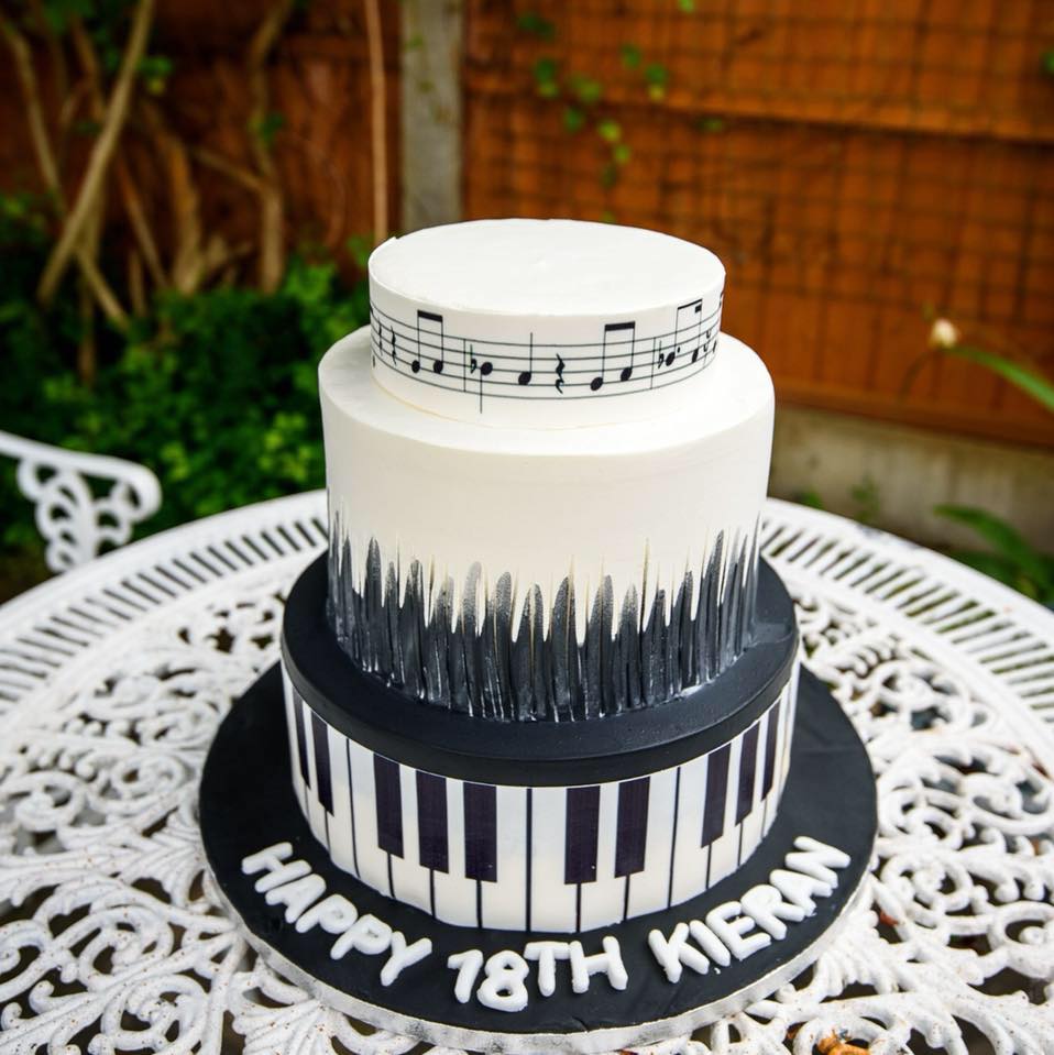 Two-tier piano keys 18th birthday cake with music notes, La-Luscious Bakery Grays